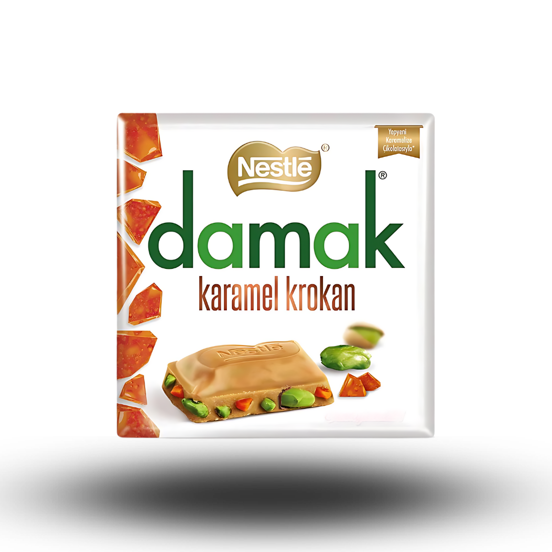 Damak Karamel Krokan 60g  Milchschokolade vereint mit knusprigen Karamellstückchen und knackigen Nüssen