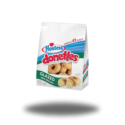 Hostess Donettes Glazed 298g, kleine, ringförmige Donuts mit süßer Glasur, ideal für Frühstück oder Snack.