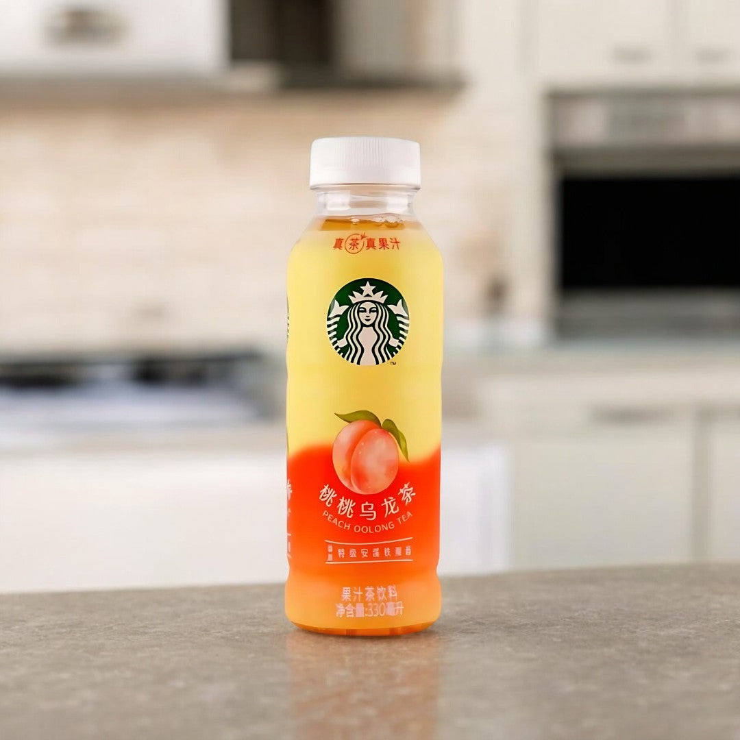 Starbucks Peach Oolong Tea Asia 330ml, Oolong-Tee mit Pfirsichgeschmack.